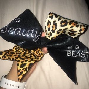 “This beauty is a beast” cheer bow